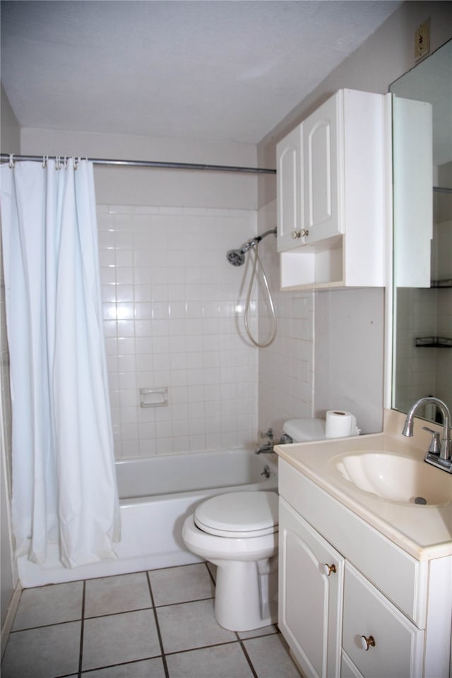 full bathroom featuring toilet, shower / tub combo, vanity, and tile patterned flooring