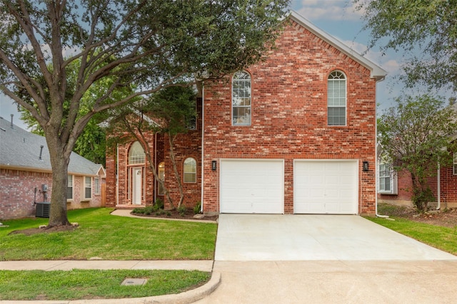 view of front of property featuring central AC and a garage