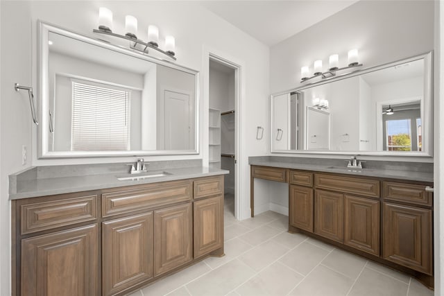 bathroom featuring tile patterned flooring and vanity