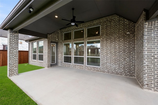 view of patio / terrace featuring ceiling fan