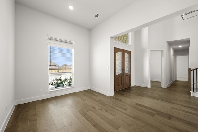 entryway with hardwood / wood-style flooring