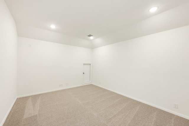 empty room with light colored carpet