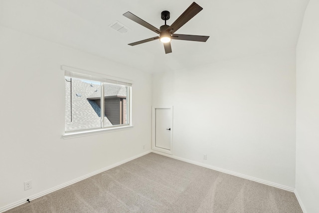 carpeted empty room with ceiling fan