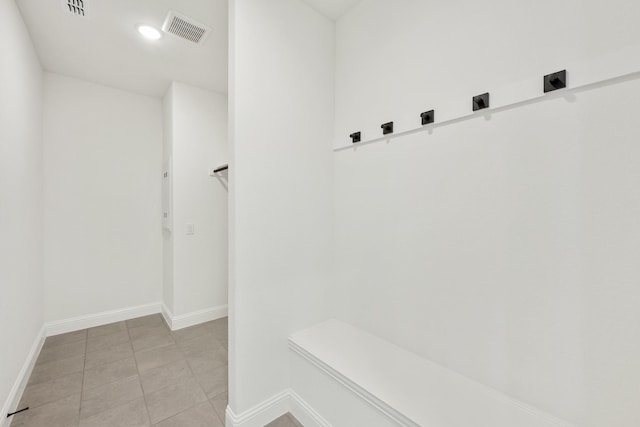 mudroom with light tile patterned flooring