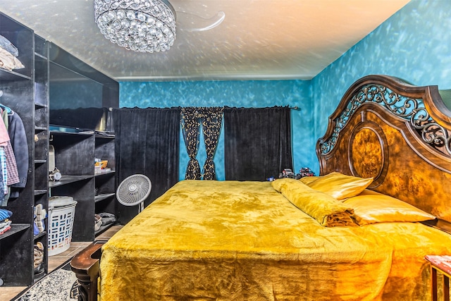 bedroom featuring a textured ceiling