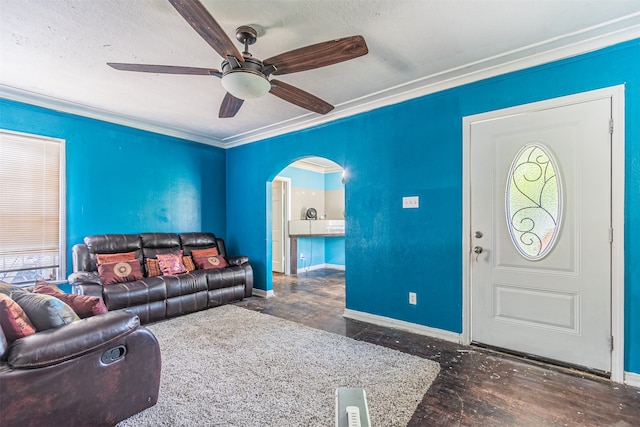 living room featuring ornamental molding, dark hardwood / wood-style floors, and ceiling fan