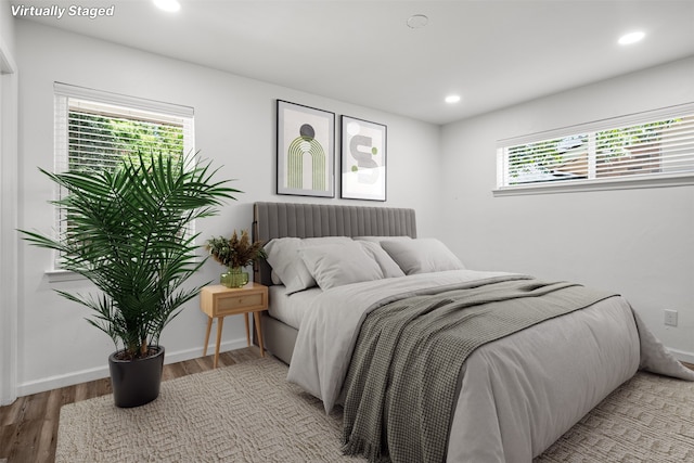 bedroom featuring wood-type flooring