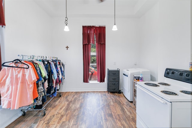 interior space with washer / clothes dryer and hardwood / wood-style flooring