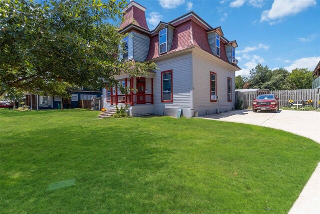 view of home's exterior with a yard