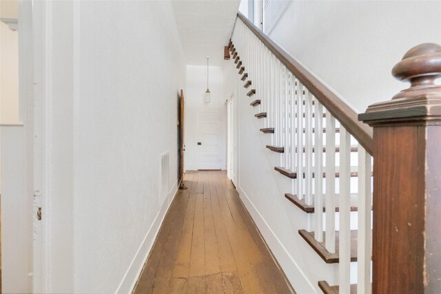 hallway featuring hardwood / wood-style floors