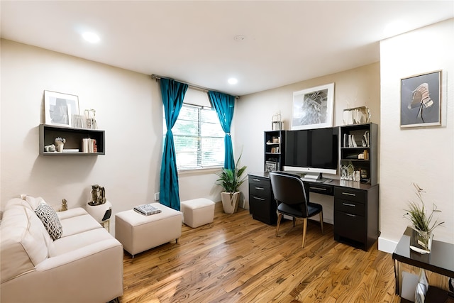 home office featuring hardwood / wood-style flooring