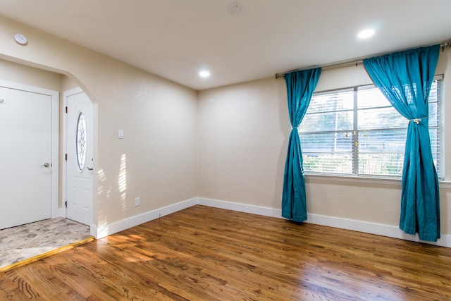 foyer with wood-type flooring