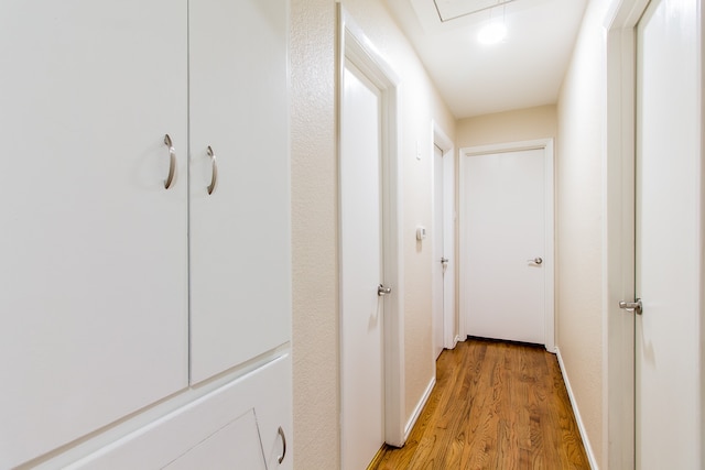 hall featuring wood-type flooring