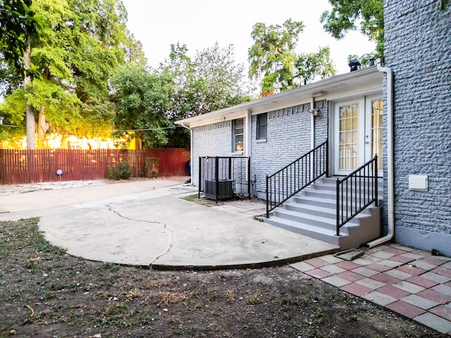 back of house with a patio