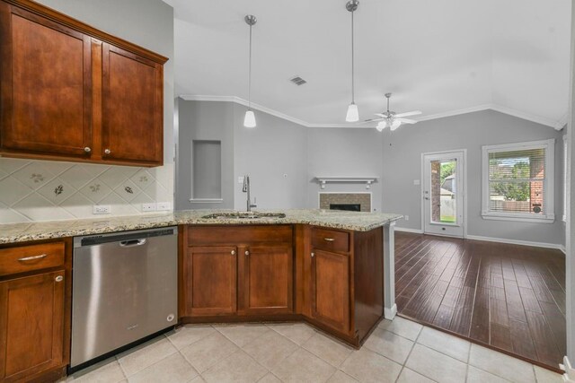 kitchen featuring crown molding, dishwasher, ceiling fan, sink, and light hardwood / wood-style flooring