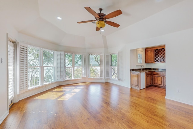 unfurnished living room featuring light hardwood / wood-style floors and a wealth of natural light