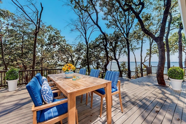 deck featuring a water view