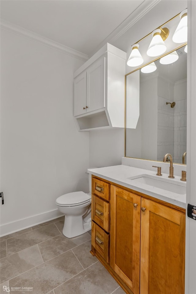 bathroom featuring toilet, a shower, vanity, and ornamental molding