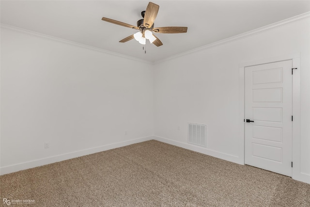 unfurnished room with ceiling fan, ornamental molding, and carpet flooring