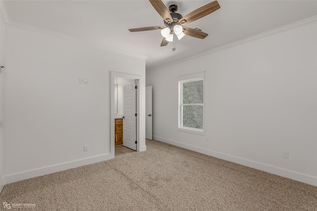 unfurnished bedroom with ceiling fan, light carpet, and crown molding