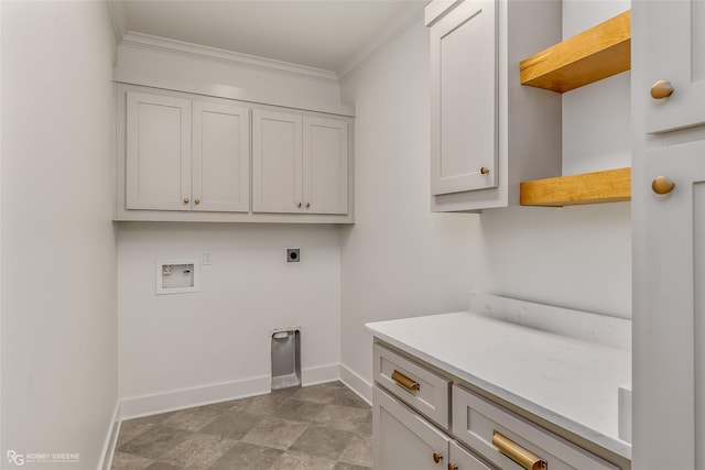 washroom featuring ornamental molding, cabinets, hookup for an electric dryer, and washer hookup