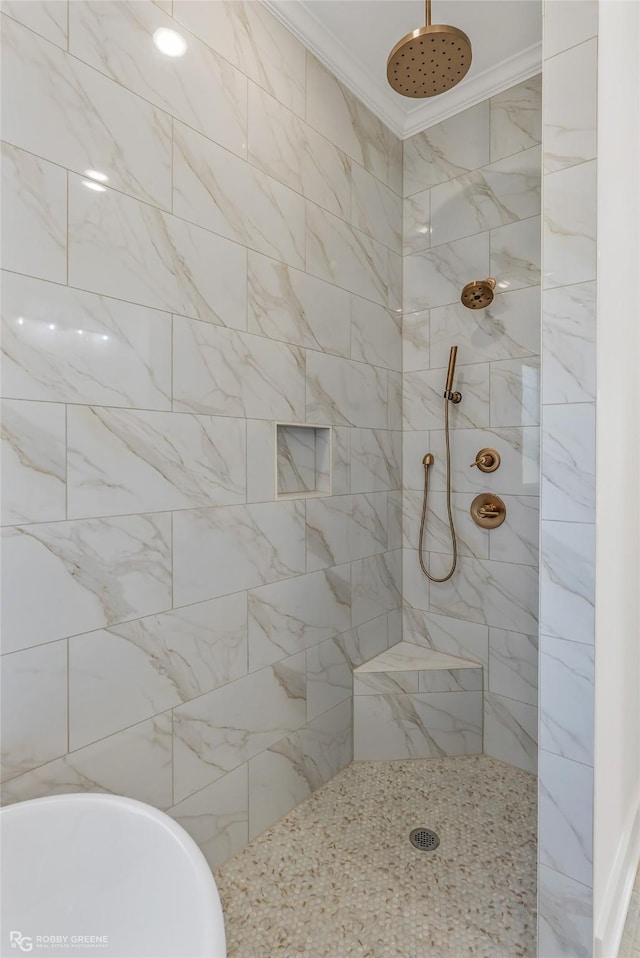 bathroom with crown molding and plus walk in shower