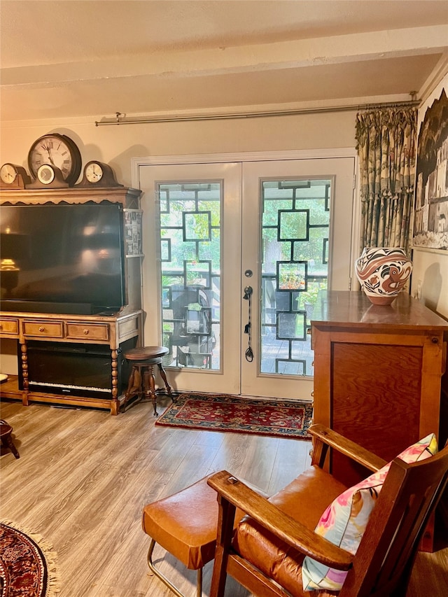 interior space featuring french doors and hardwood / wood-style flooring