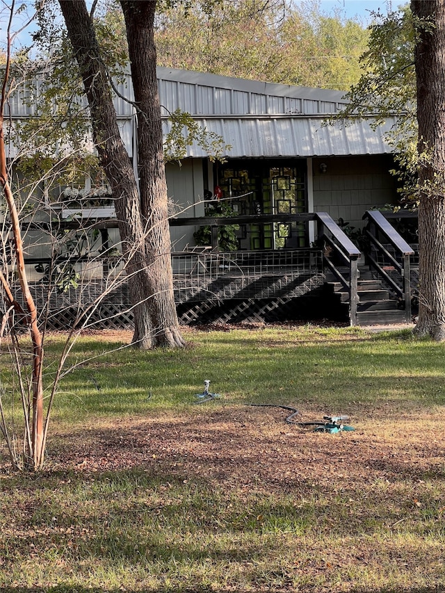 exterior space with a lawn