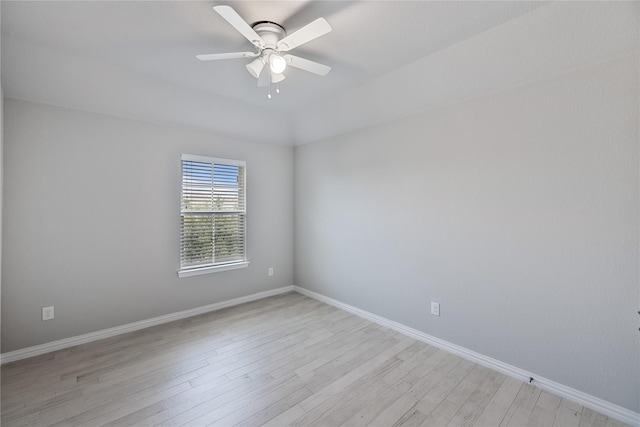 empty room featuring ceiling fan and light wood-type flooring