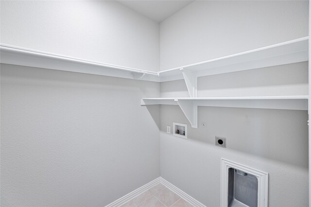 laundry area featuring electric dryer hookup, hookup for a gas dryer, and washer hookup