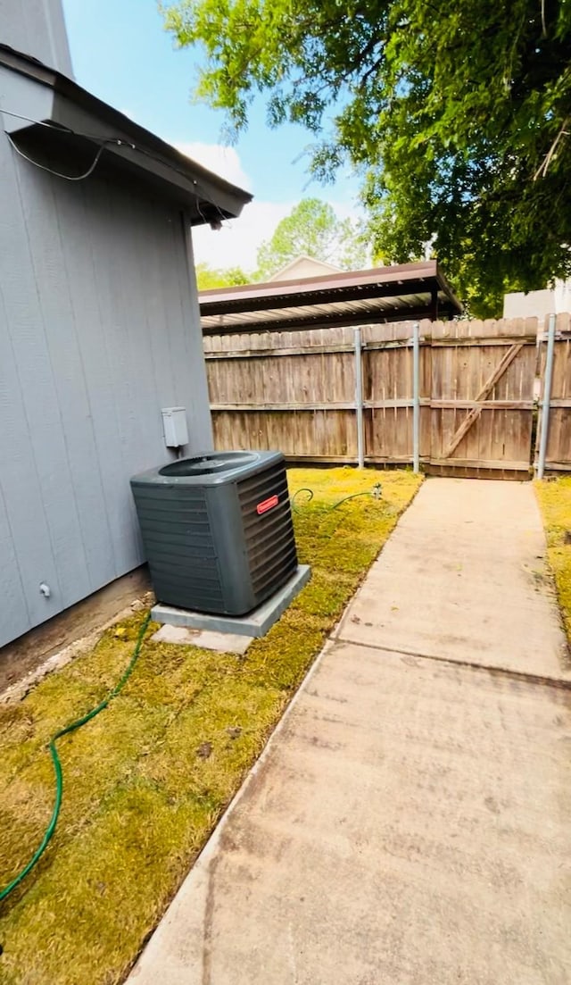 view of yard with central air condition unit