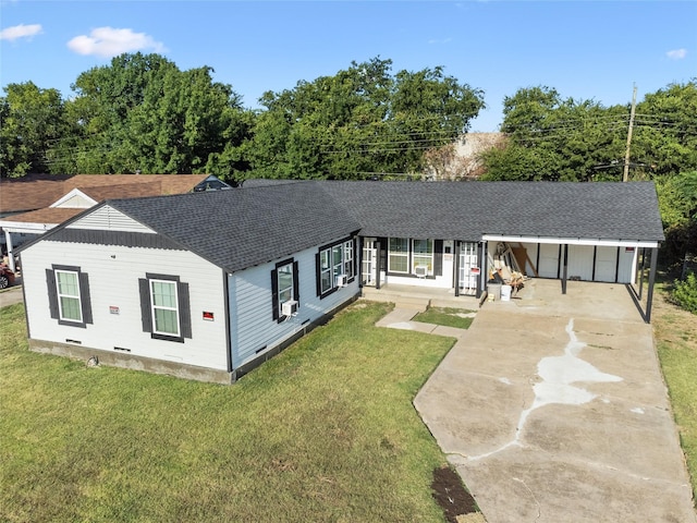 view of front of home featuring a front lawn, concrete driveway, roof with shingles, and crawl space