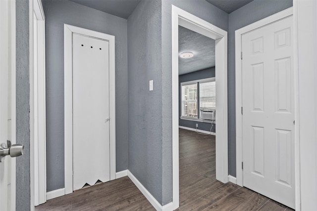 corridor with cooling unit and dark wood-type flooring