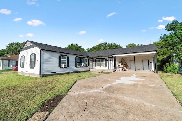 view of front facade with concrete driveway, a front yard, a shingled roof, crawl space, and a carport