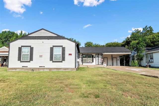 view of front of property featuring crawl space, an attached garage, concrete driveway, and a front yard