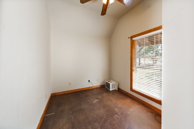 spare room featuring vaulted ceiling and ceiling fan