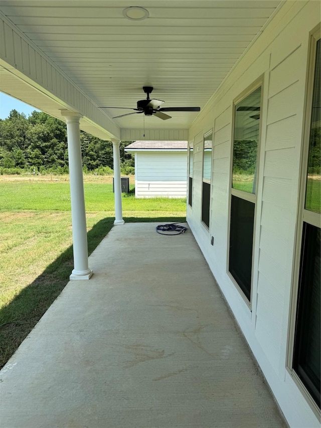 view of patio / terrace with ceiling fan and a porch