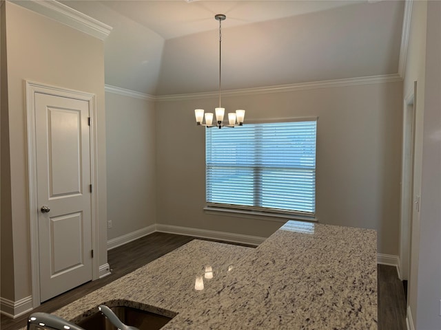 kitchen with an inviting chandelier, hanging light fixtures, crown molding, and dark hardwood / wood-style flooring