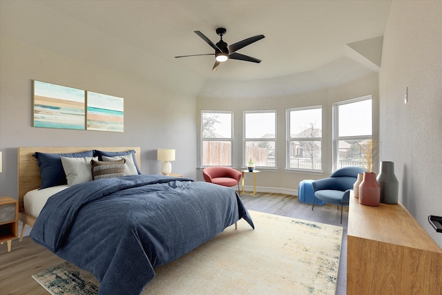 bedroom featuring ceiling fan and light hardwood / wood-style floors