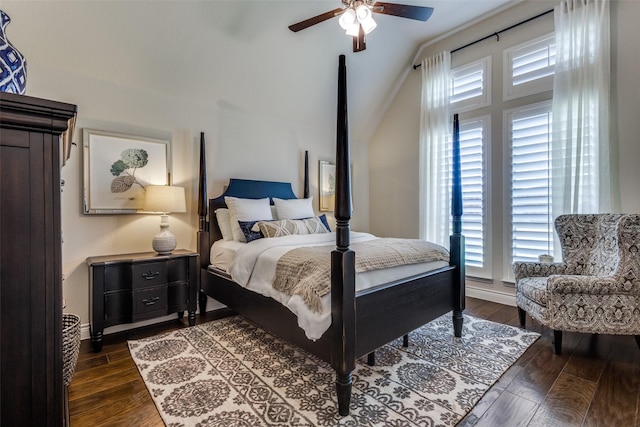 bedroom featuring ceiling fan, baseboards, vaulted ceiling, and dark wood-type flooring