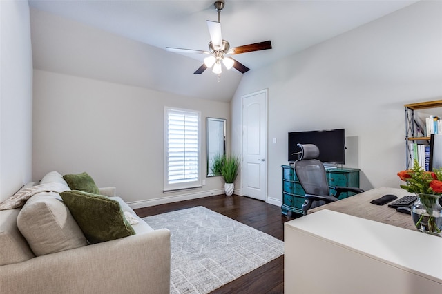 office area featuring a ceiling fan, dark wood finished floors, vaulted ceiling, and baseboards