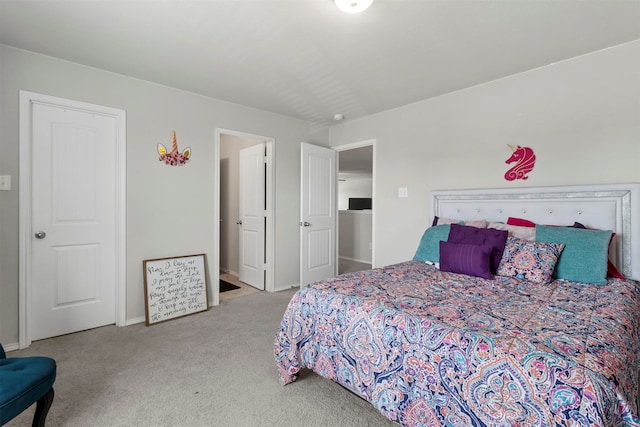 bedroom featuring light colored carpet