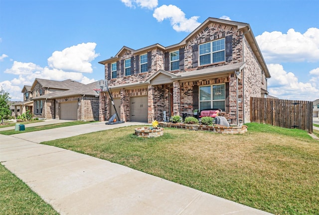 view of front of house featuring a garage and a front lawn