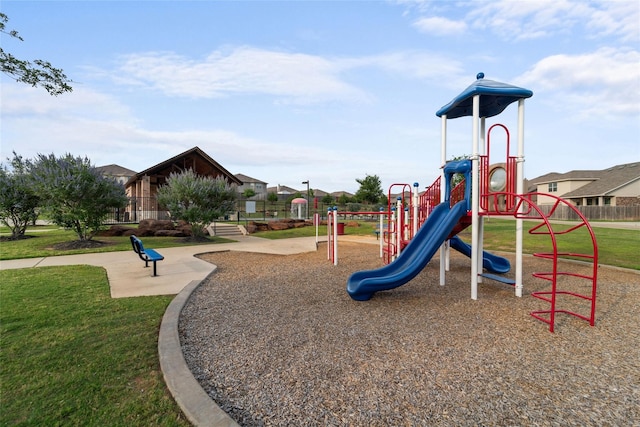 view of play area featuring a lawn