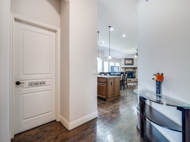 hall featuring dark wood-type flooring