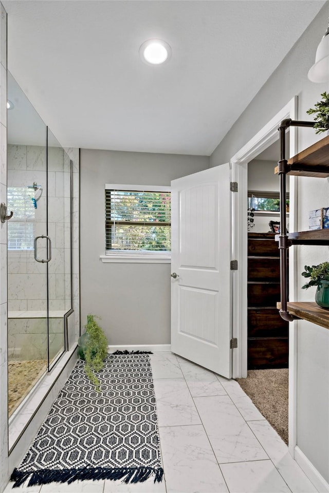 bathroom with an enclosed shower