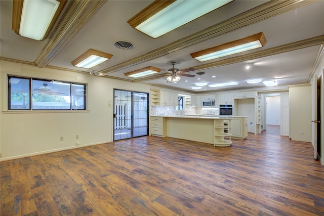 unfurnished living room with sink, crown molding, dark hardwood / wood-style flooring, and ceiling fan