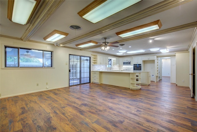 kitchen with open shelves, light countertops, appliances with stainless steel finishes, open floor plan, and a peninsula