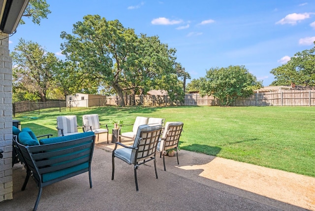 view of patio / terrace with a shed