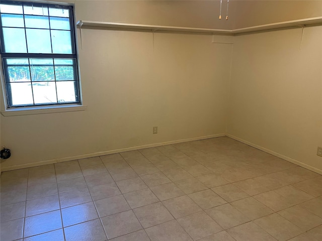 view of tiled spare room